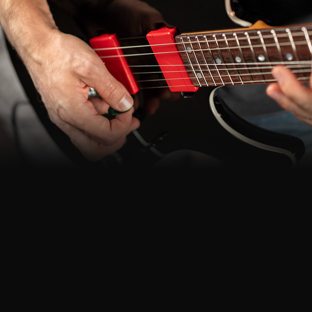 Guitarist performing with his guitar equipped with Fluence Modern Humbucker 6-String guitar pickups