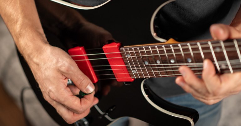 Guitarist performing with his guitar equipped with Fluence Modern Humbucker 6-String guitar pickups